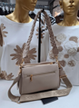 Béžová crossbody kabelka elegancia s dvoma ramienkami.