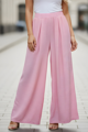 Dámske široké nohavice na gumu ružové.