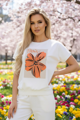 Dámske bavlnené tričko Megi Collection biele s oranžovým motívom veľkého kvetu.