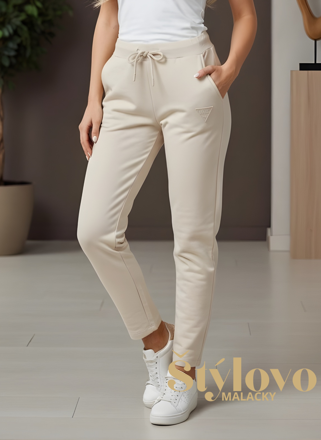 Dámske tepláky Megi Collection smotanové.