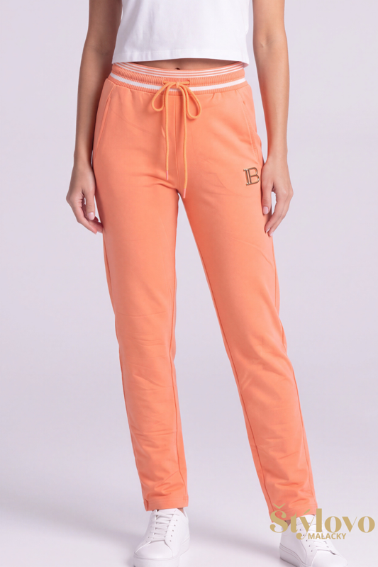 Dámske bavlnené tepláky Megi Collection oranžové so zlatým logom.