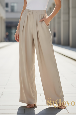 Dámske široké nohavice na gumu smotanové.