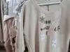 Dámska bavlnená mikina Megi Collection biela s mentolovými kvetmi.
